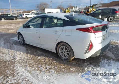 2021 Toyota Prius Prime Limited z USA, uszkodzony, nr VIN JTDKAMFP6M3174953